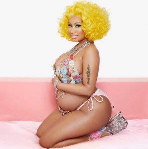 Cute as a button: Nicki Minaj flashes her baby bump for the first time 2