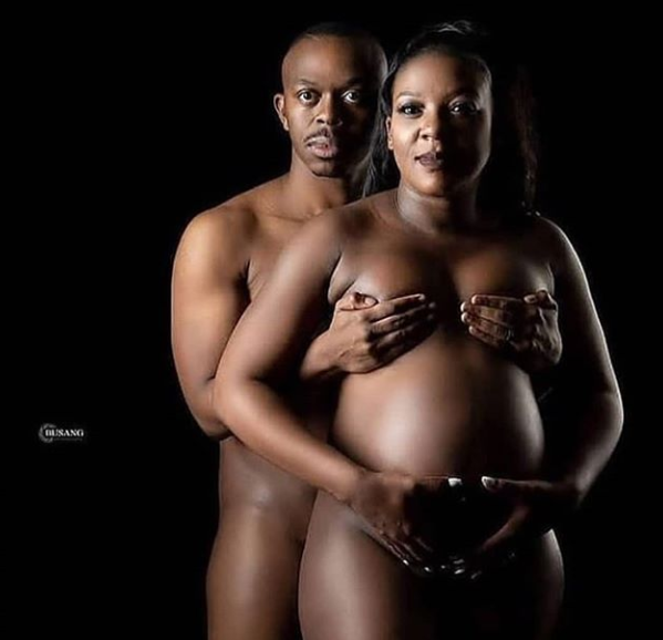 A black couple posing for a pregnancy shoot. (lindaikejisblog)