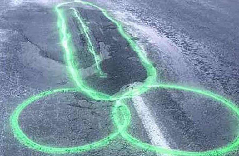Man paints 100 penises over potholes to draw attention on road safety