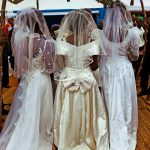Woman causes a scene after storming wedding party completely naked. (The New York Times)
