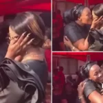 Borga Sylvia and Nana Ama kiss in a funeral