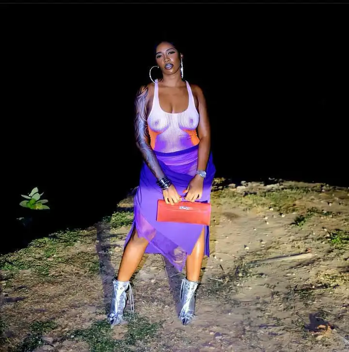 Tiwa Savage shows nipples at an event 