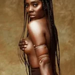 Tiwa Savage shows off her tits