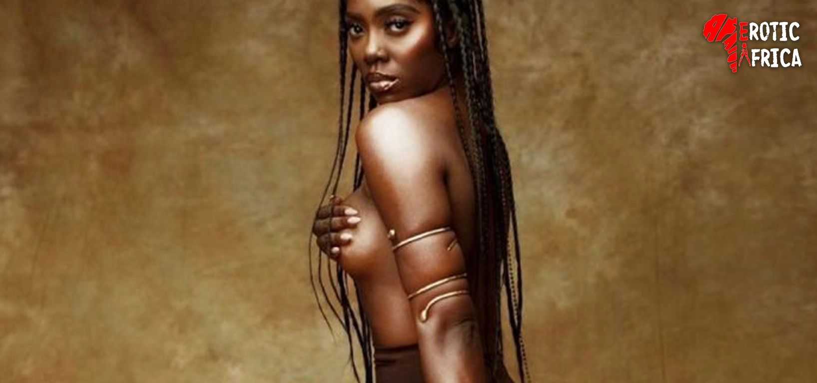 Tiwa Savage shows off her tits