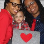 Gay couple welcomes baby girl
