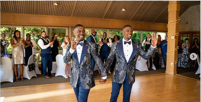 gay couple after their wedding