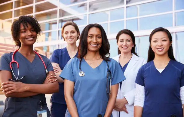 beautiful nurses on duty pose for photo